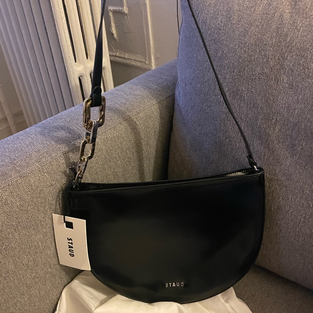 STAUD Black Half Moon Shoulder Bag with Gold Chain Accent
